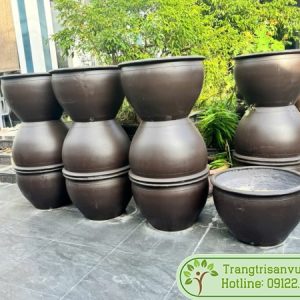 Chậu xi măng tròn dáng chum